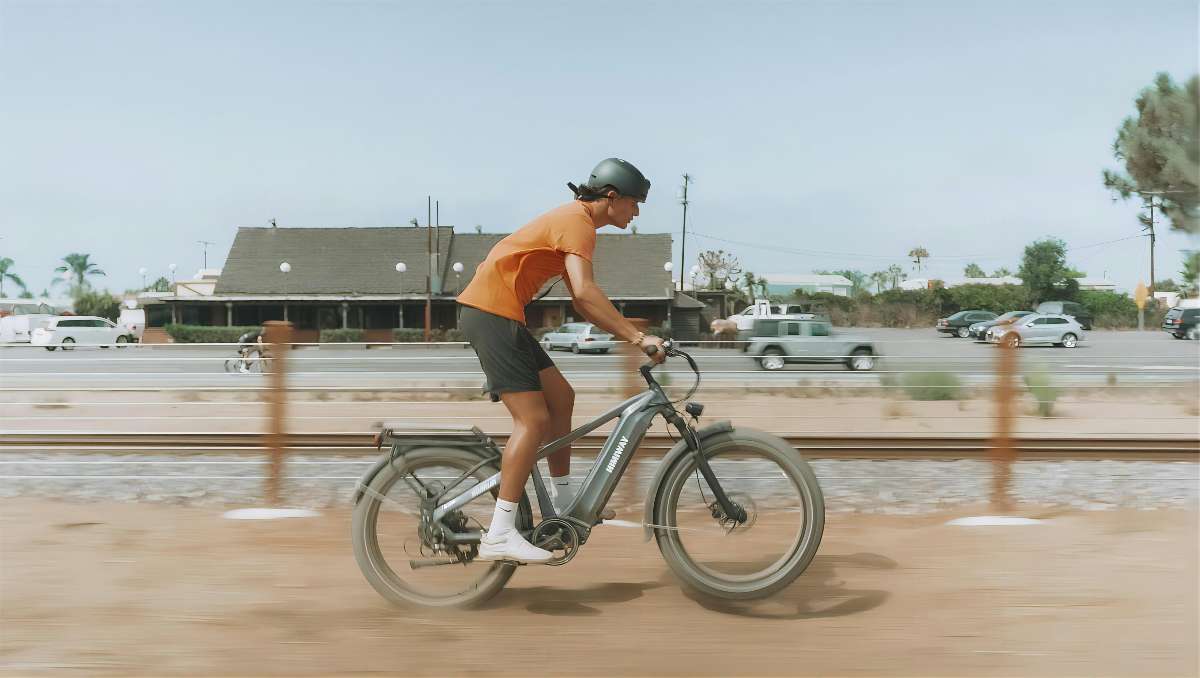 man riding e-bike finding calories burned e-bike vs bike