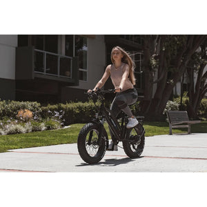 Troxus-Skyhopper-750W-Step-Thru-Fat-Tire-Electric-Bike-Step-Through-Troxus-Mobility- girl riding an ebike 2 