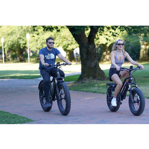 Troxus-Vulcanus-750W-Fat-Tire-Electric-Bike-fat-Troxus-Mobility-  Girl and man Riding ebikes 